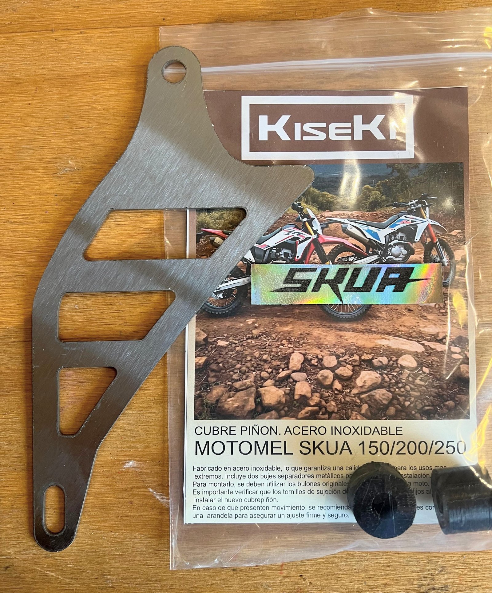 CUBRE PIÑON. ACERO INOXIDABLE  MOTOMEL SKUA 150/200/250